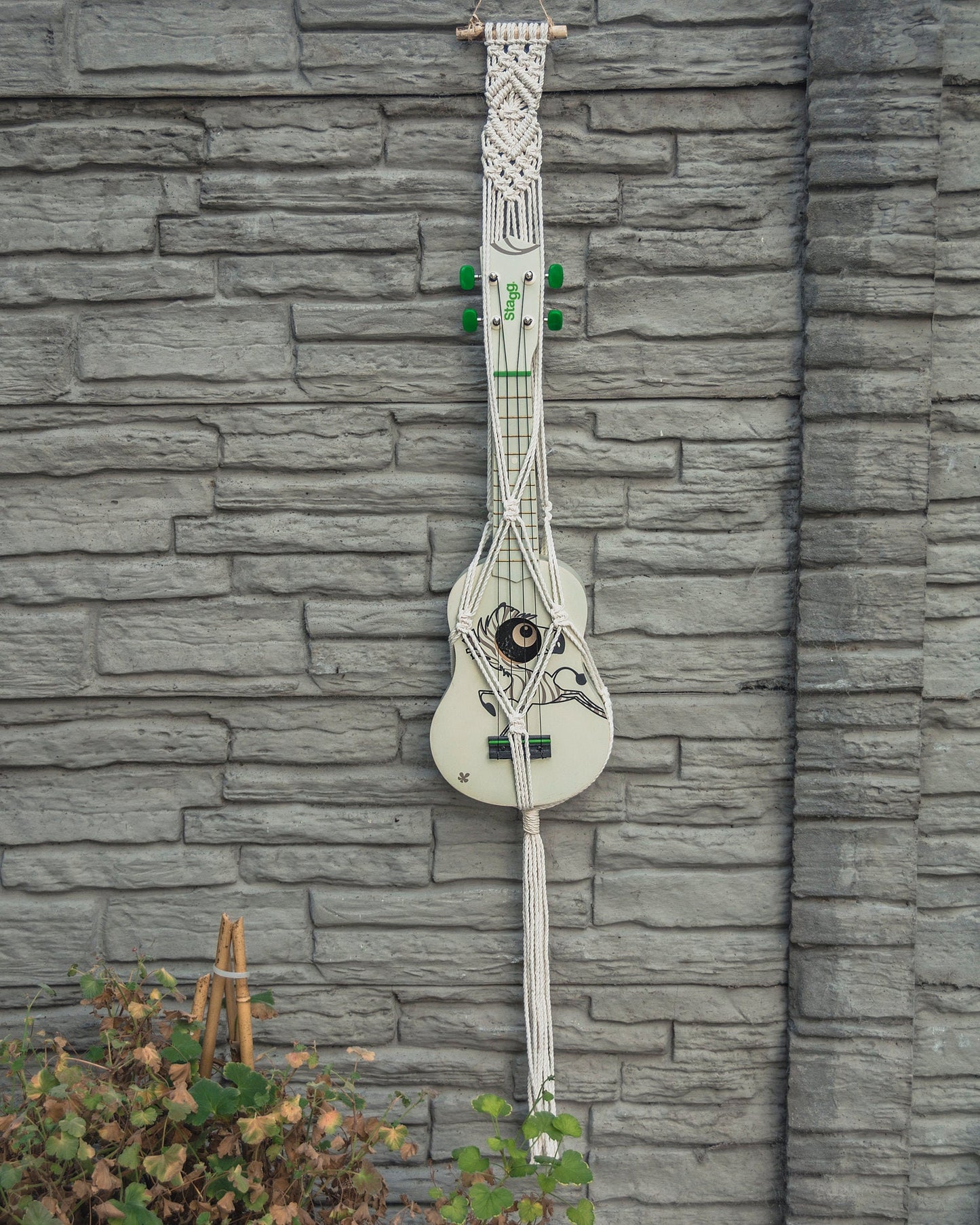 Modern ukulele hanger