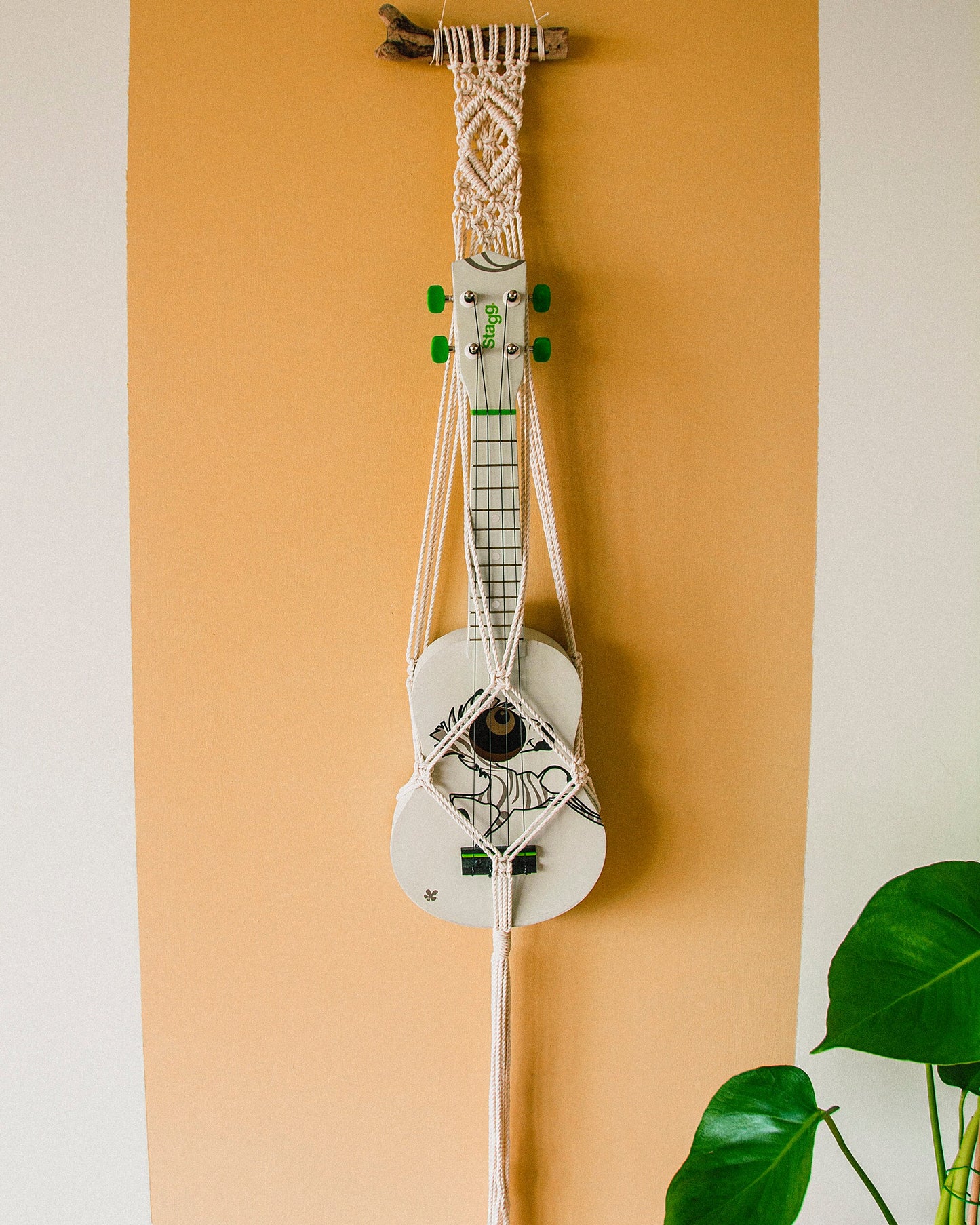 Modern ukulele hanger